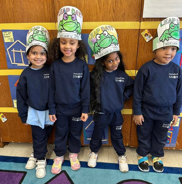 early childhood students in leap day hats
